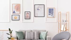 How to Hang Artwork Without Making a Hole in The Wall 2024 